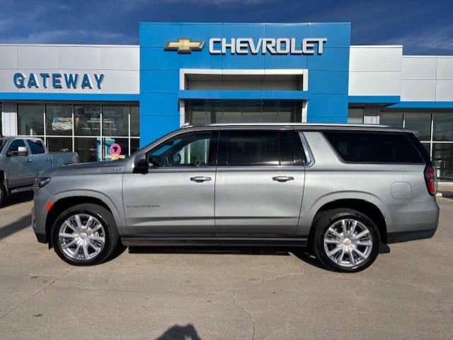 2023 Chevrolet Suburban High Country in Sterling Gray Metallic — front three-quarter view
