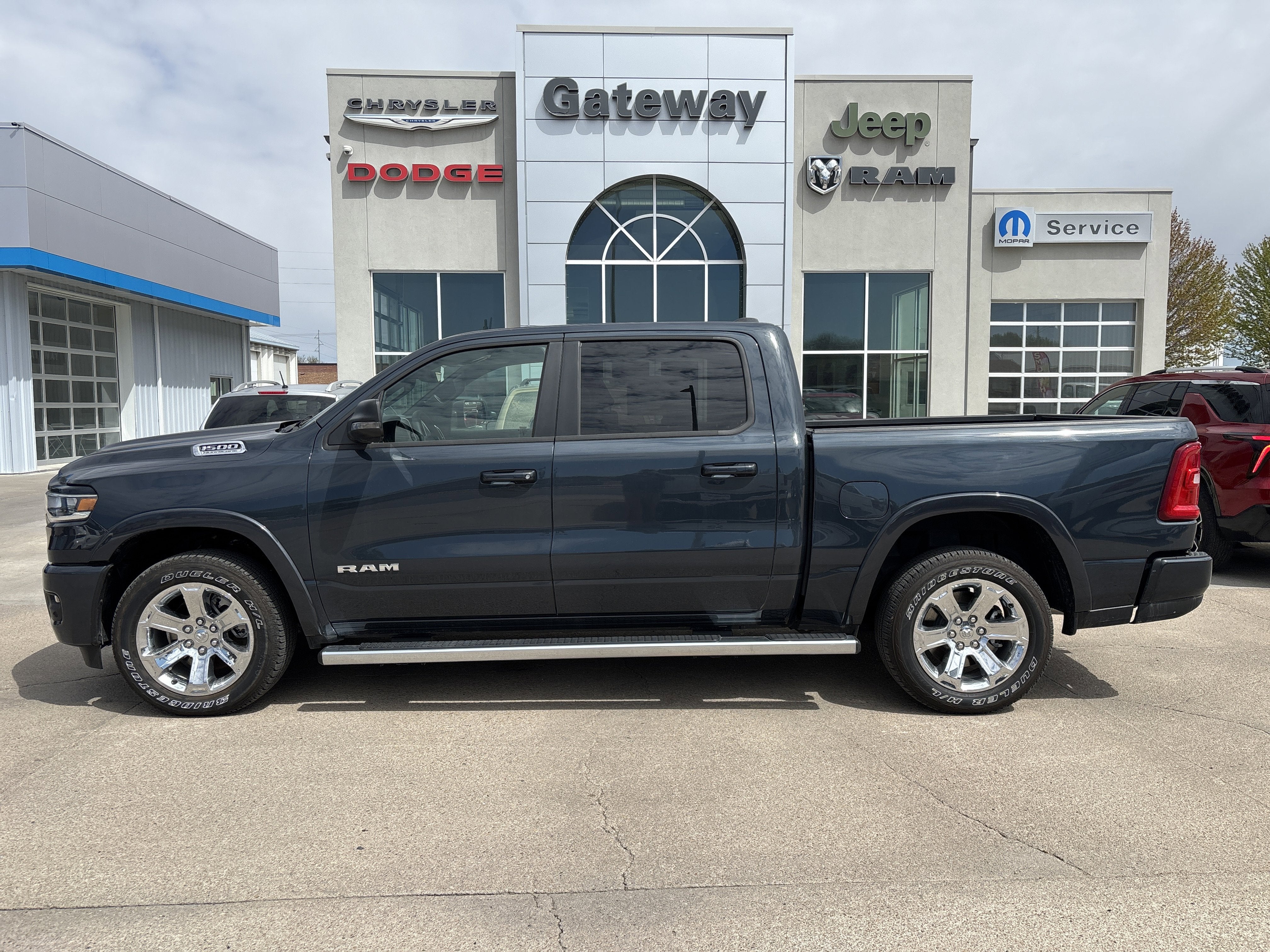 2026 RAM 1500 RAM 1500 BIG HORN CREW CAB 4X4 5'7' BOX in Forged Blue Metallic — front three-quarter view