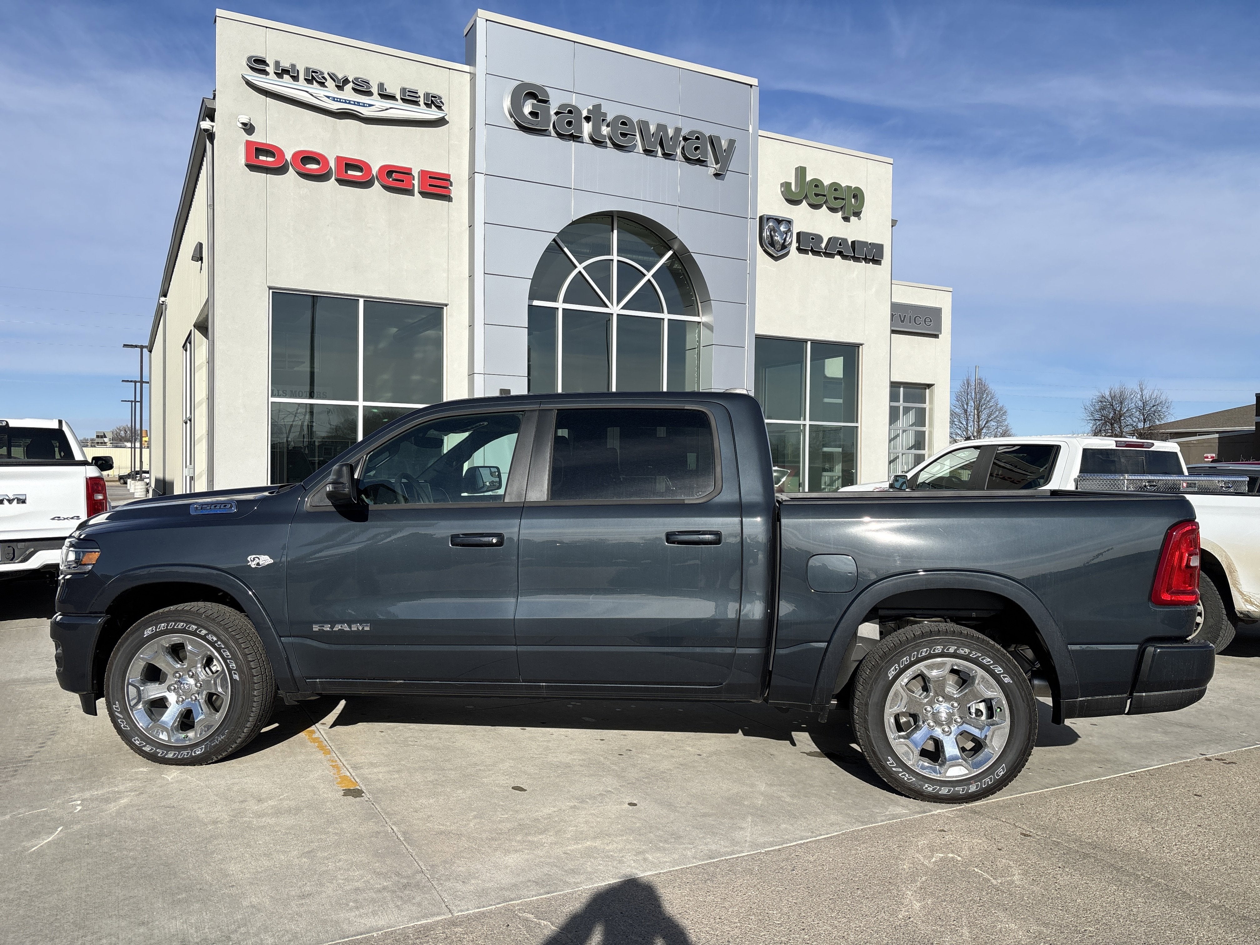2026 RAM Ram 1500 RAM 1500 BIG HORN CREW CAB 4X4 5'7' BOX in Forged Blue Metallic Exterior Paint — front three-quarter view
