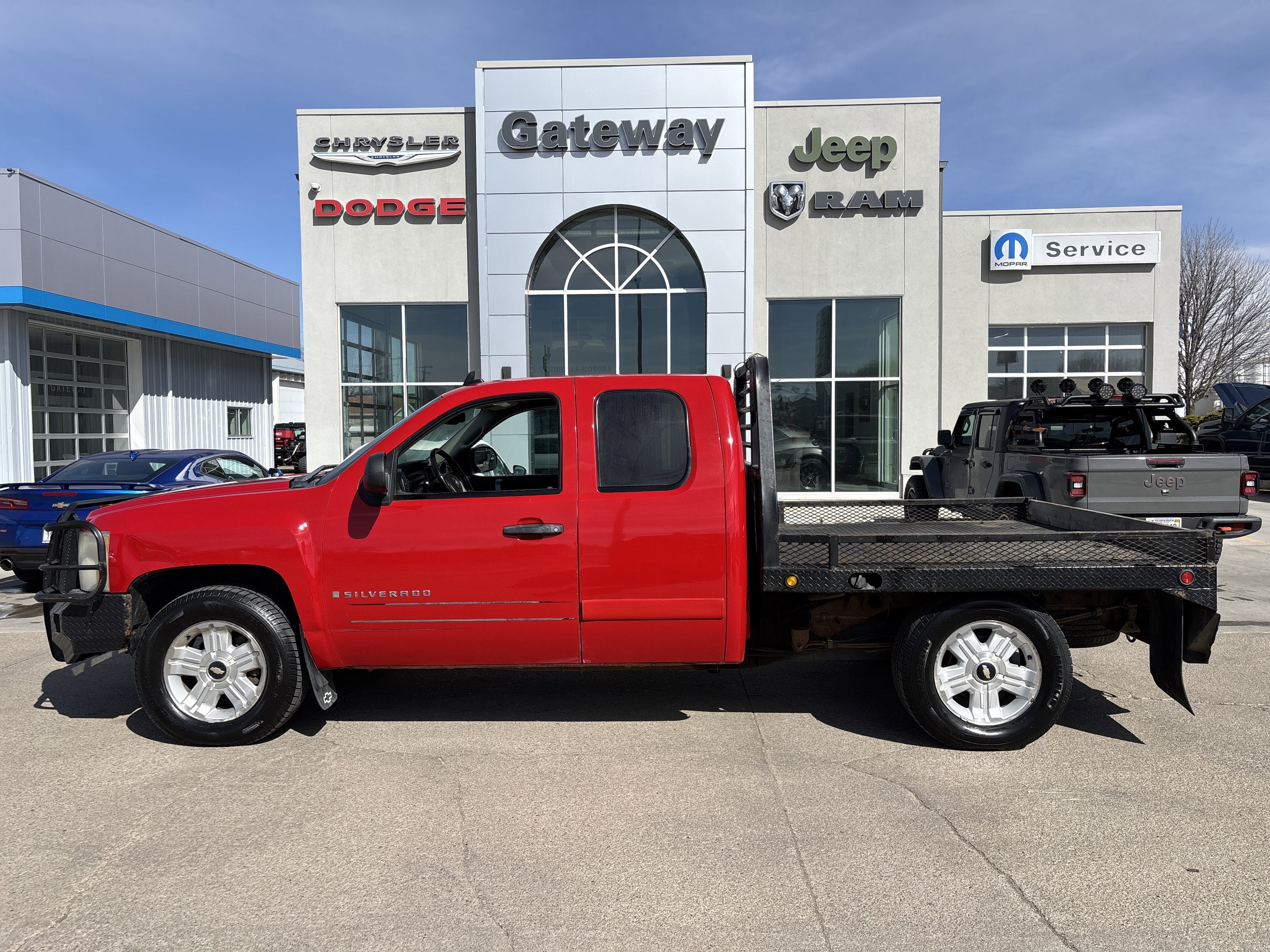 2007 Chevrolet Silverado 1500 LT1 in Victory Red — front three-quarter view