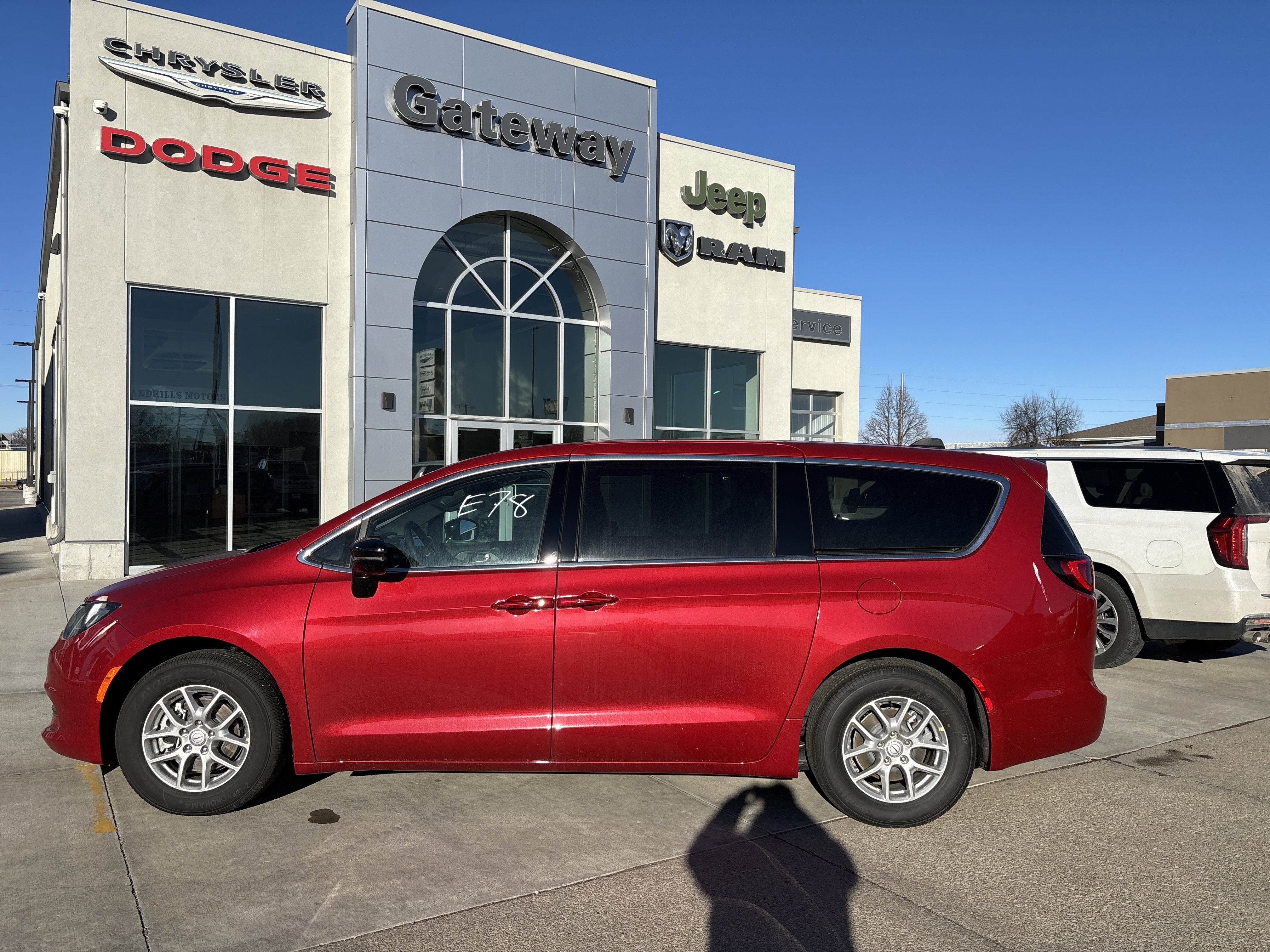 2026 Chrysler Voyager VOYAGER LX in Red Hot Pearl-Coat Exterior Paint — front three-quarter view