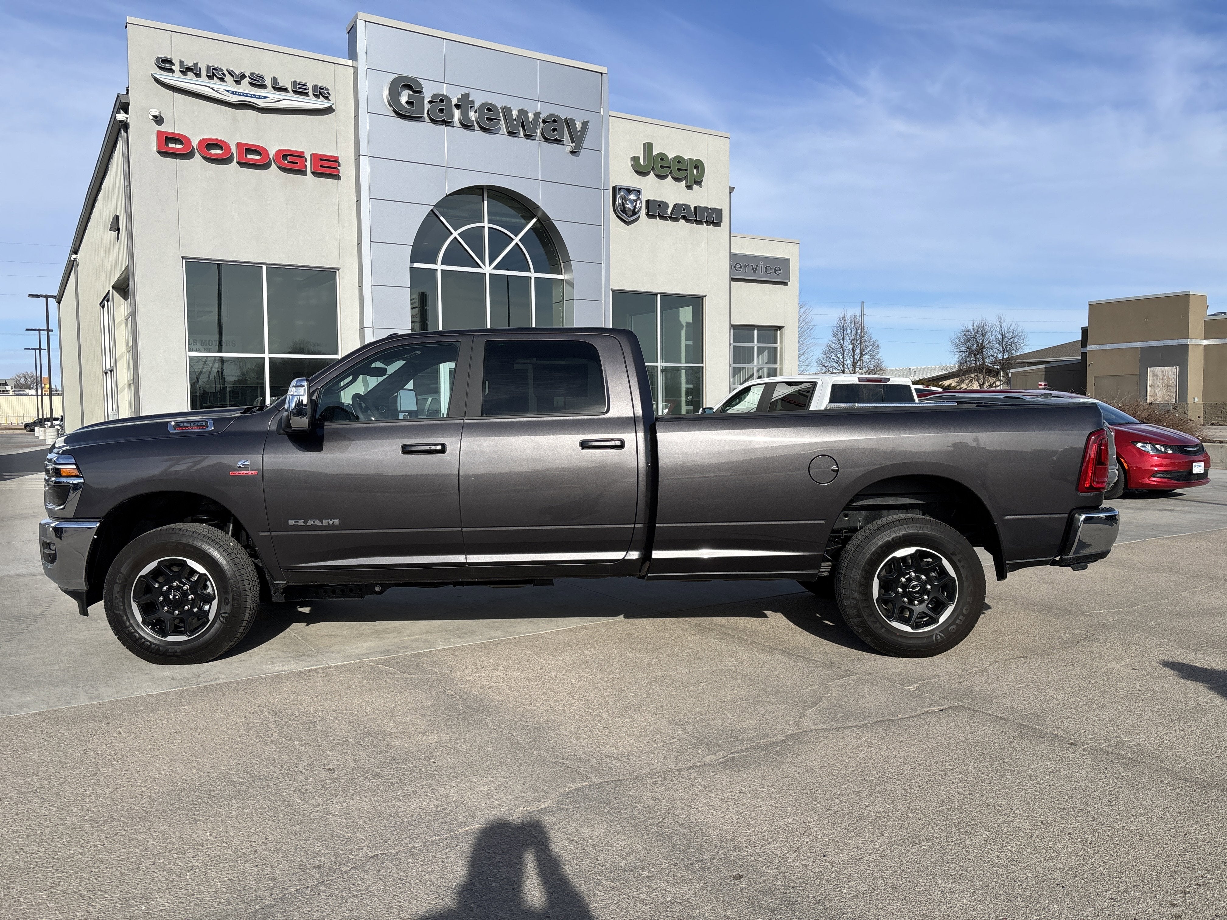 2026 RAM Ram 3500 RAM 3500 LARAMIE CREW CAB 4X4 8' BOX in Granite Crystal Metallic Clear-Coat Exterior Paint — front three-quarter view