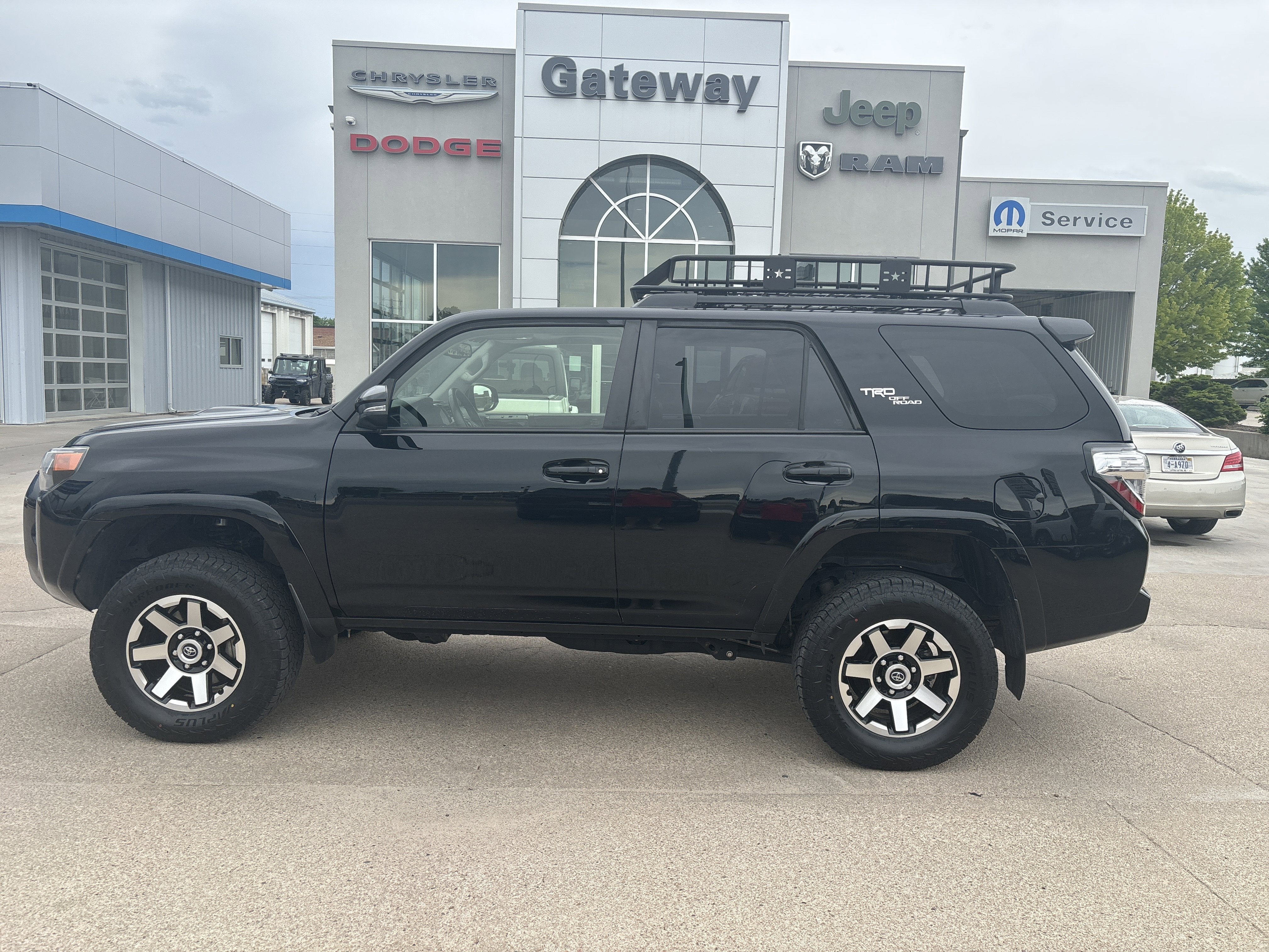 2021 Toyota 4Runner TRD Off Road Premium in Midnight Black Metallic — front three-quarter view